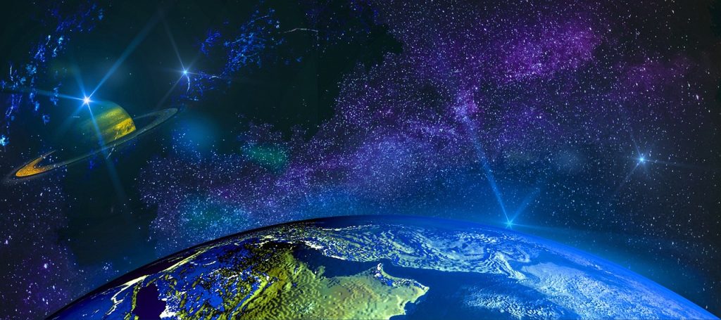 Space shot of earth white purple galaxy behind it.